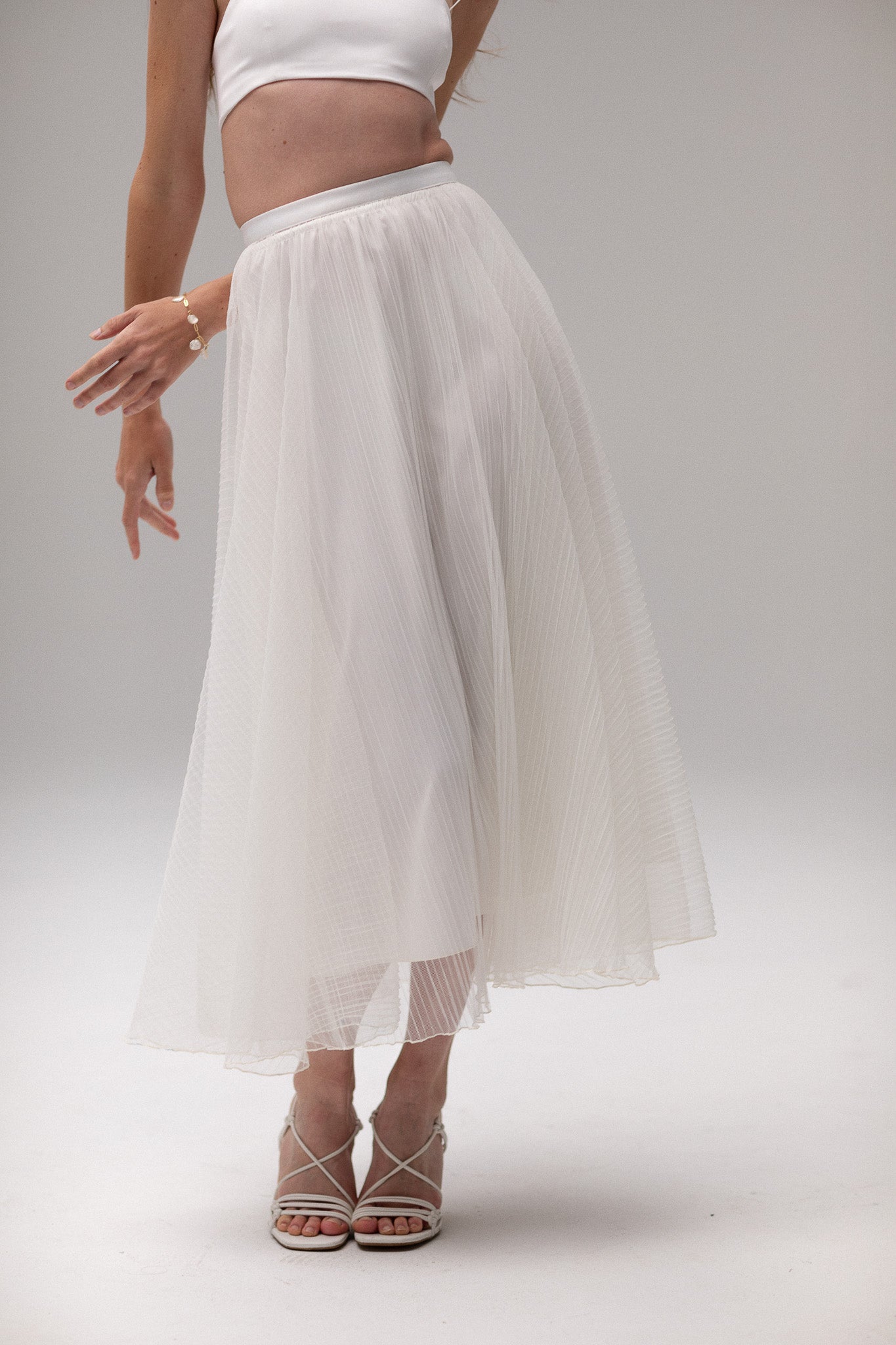 Pleated Bridal Skirt on a model by TEMPÊTE Bridal Boutique
