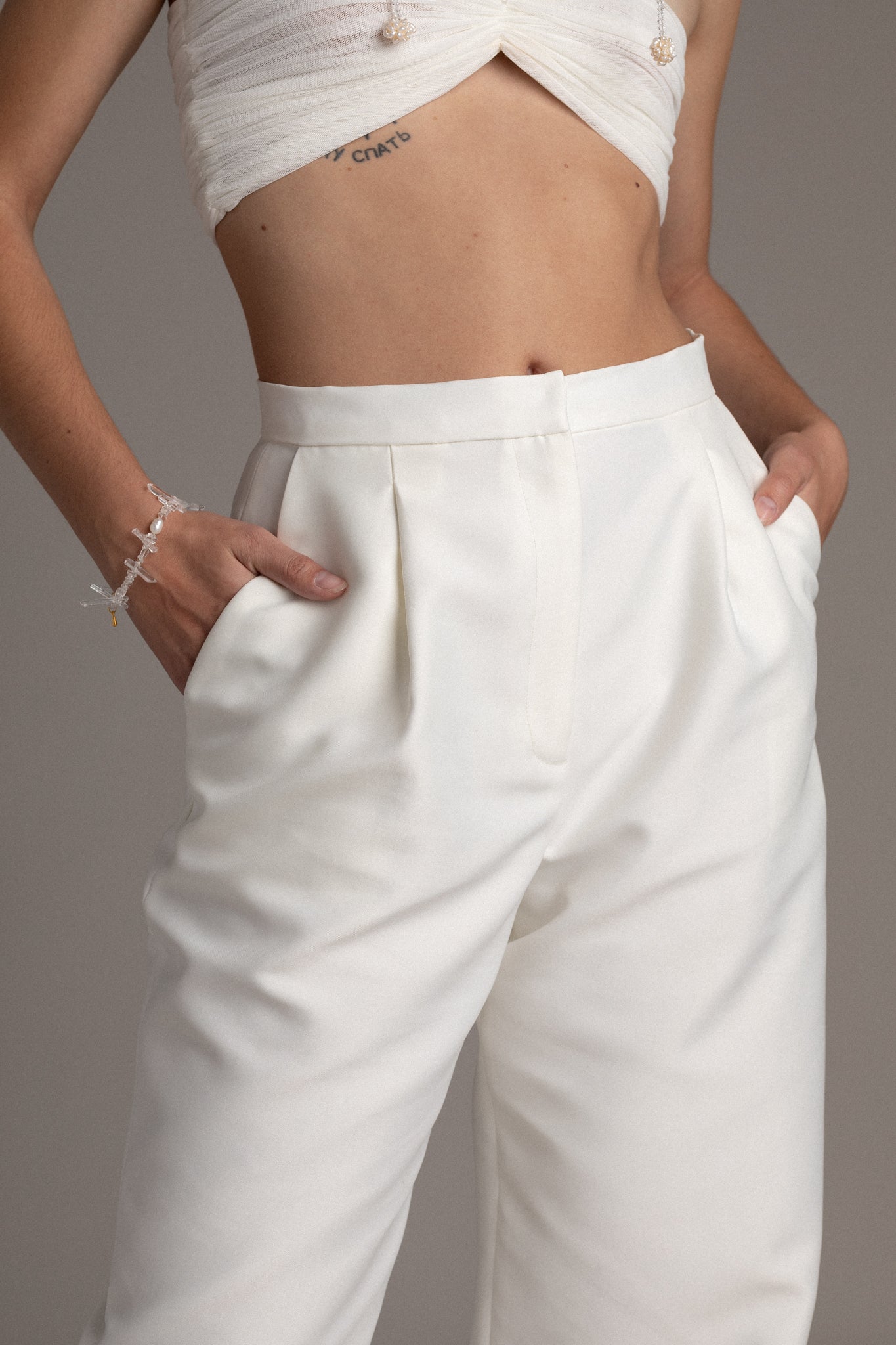 Crafted from premium Duchess Satin, these pants exude sophistication. The satin weave, woven with delicate silk threads, offers a semi-lustrous sheen for an elegant touch.