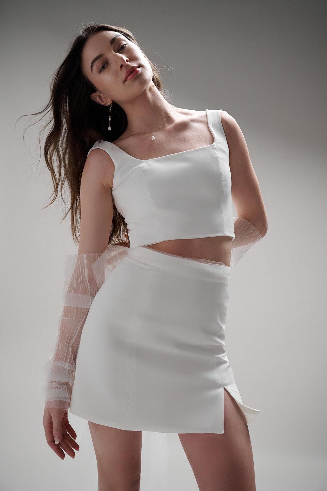 The perfect mini skirt for the bold and modern bride who loves to make a statement. This rebellious piece is designed to turn heads and is a must-have for those who aren't afraid to break bridal fashion traditions.