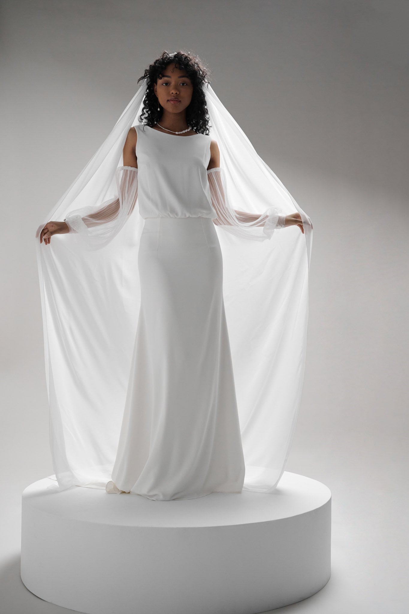 Classic chiffon veil which drapes around your shoulders as you walk down the aisle
