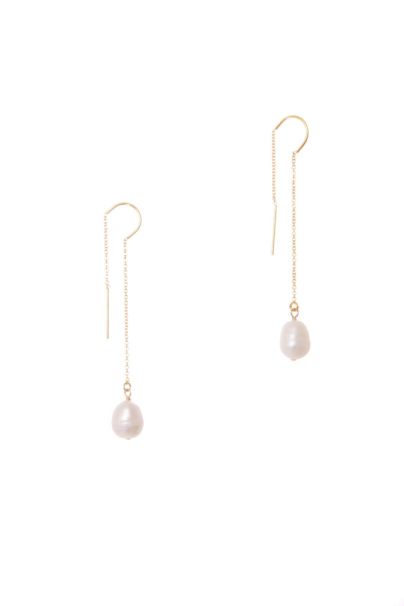 Crafted from organic, freshwater pearls and 14k gold-filled chain, these modern and sophisticated threader earrings add a luxurious touch to your outfit. 