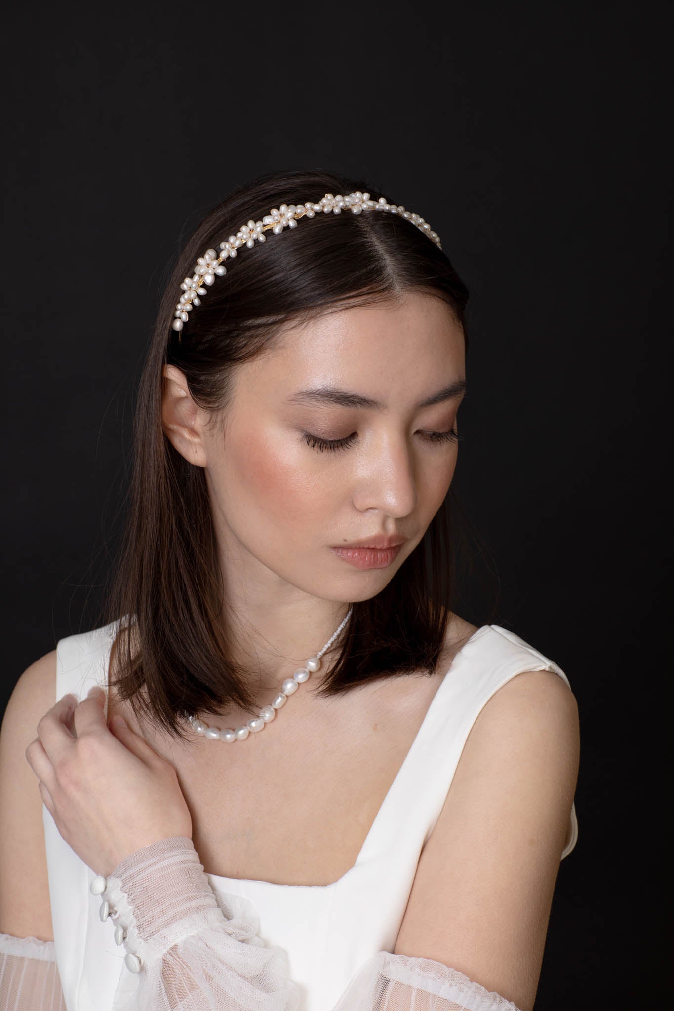 Sophisticated and dreamy pearl headband will compliment any bridal look. Look like a goddess walking down the aisle with light shimmering off each individual pearl.