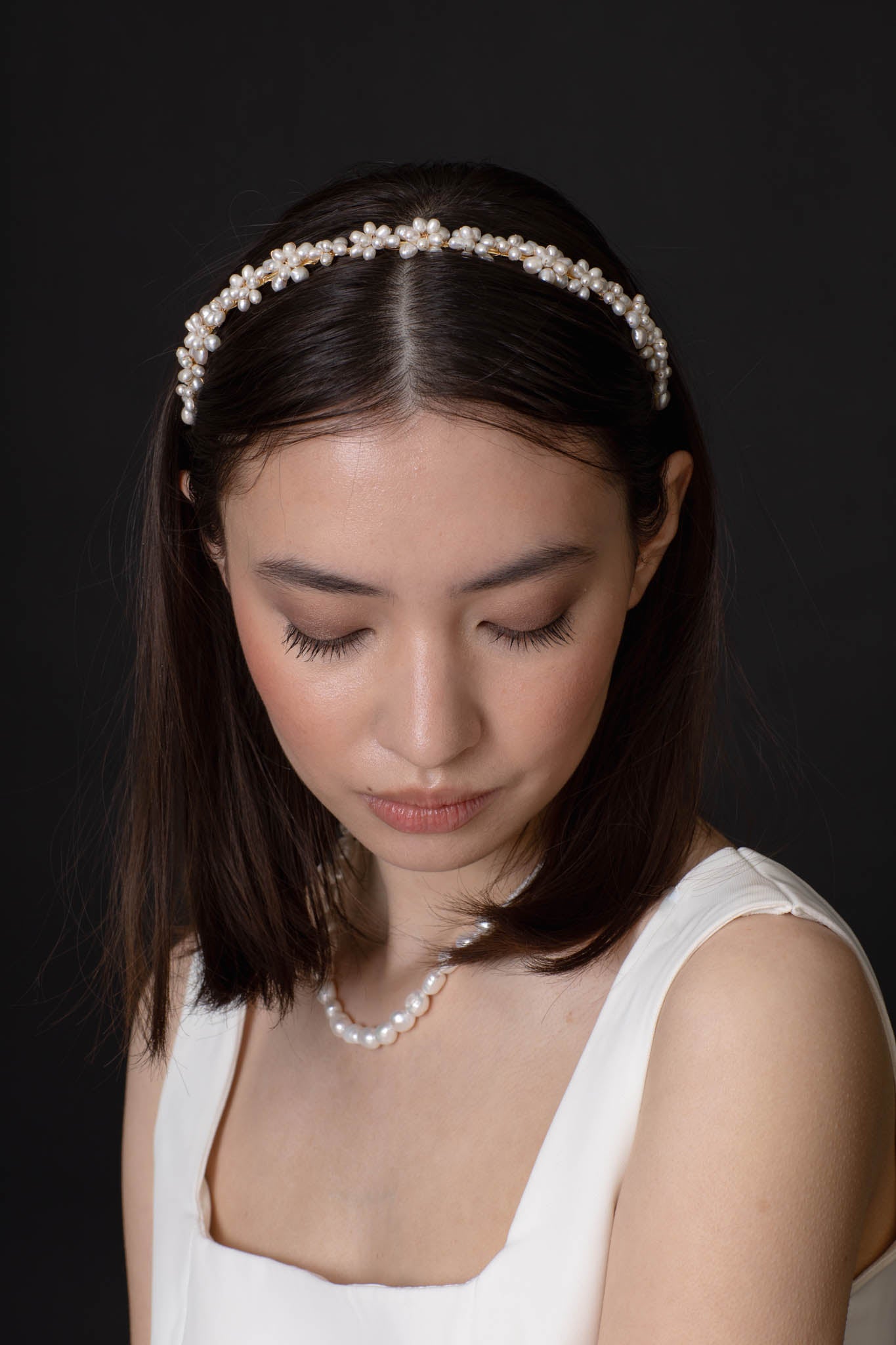 Sophisticated and dreamy pearl headband will compliment any bridal look. Look like a goddess walking down the aisle with light shimmering off each individual pearl.